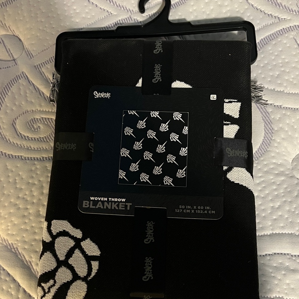 Stylish Black and White Woven Throw Blanket skeleton number one in my book